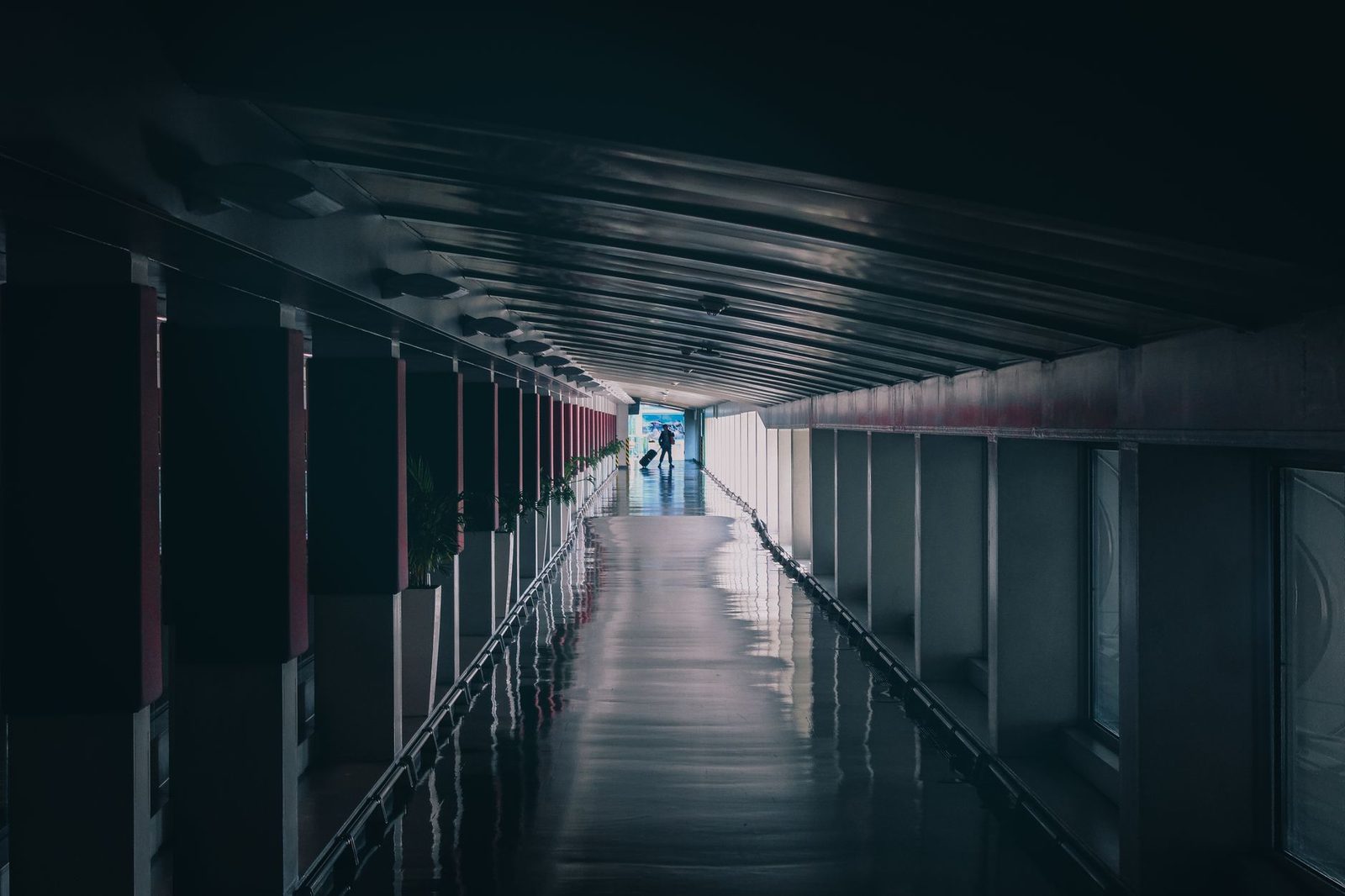 A striking, empty corridor in Seoul with framed symmetry and moody lighting.